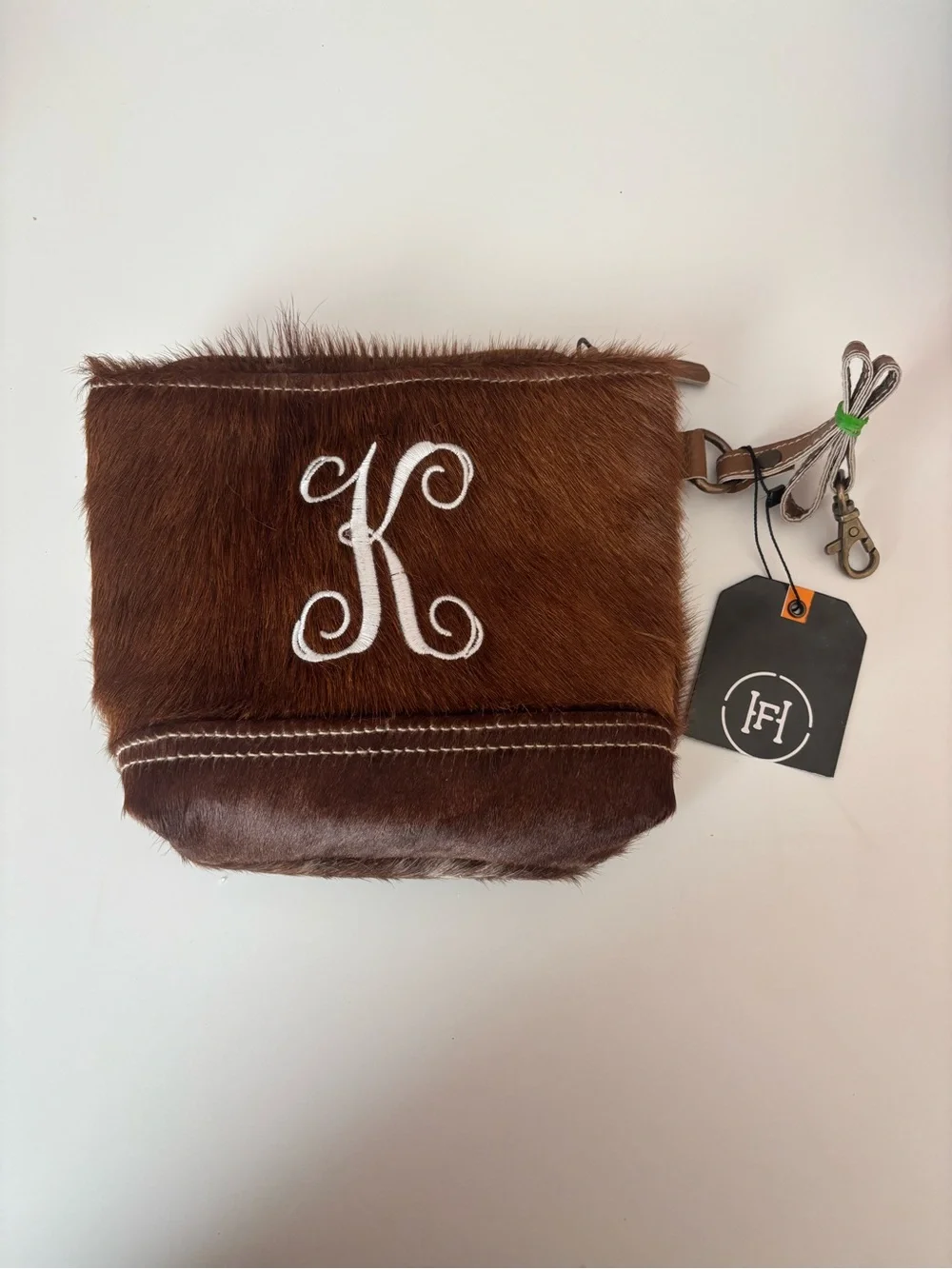 Handcrafted Brown Hair-On Hide Wristlet with White Monogram K